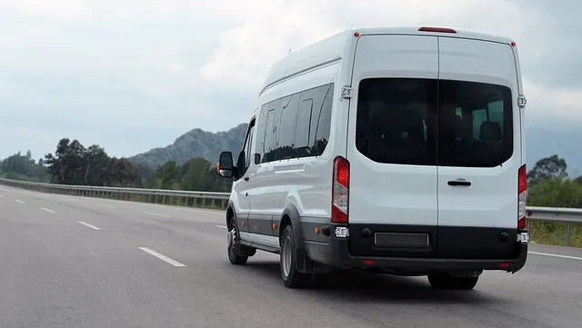 A van being driven by an expert